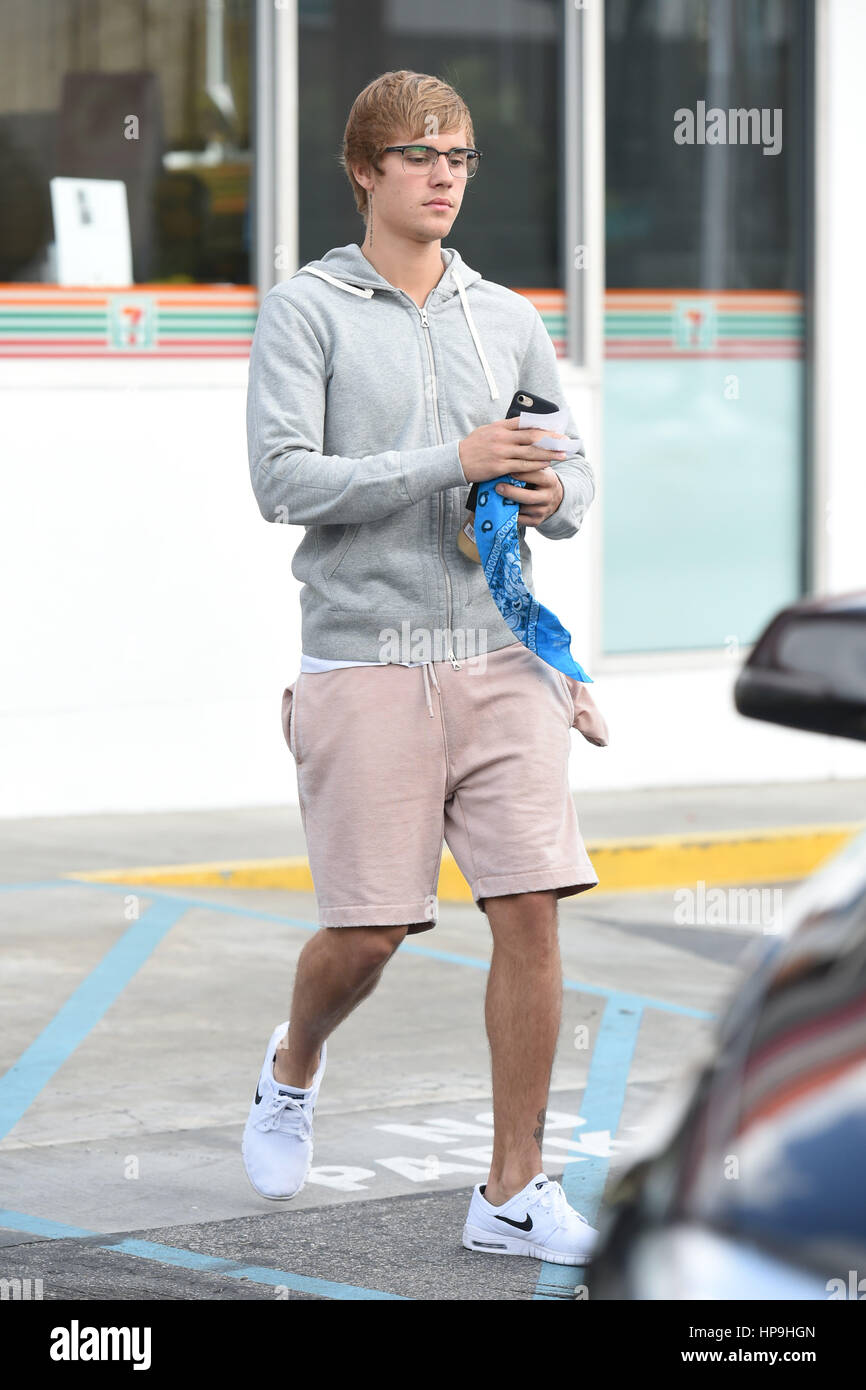 Justin Bieber goes into the gas station and gets stuck behind a slower moving patron on the way