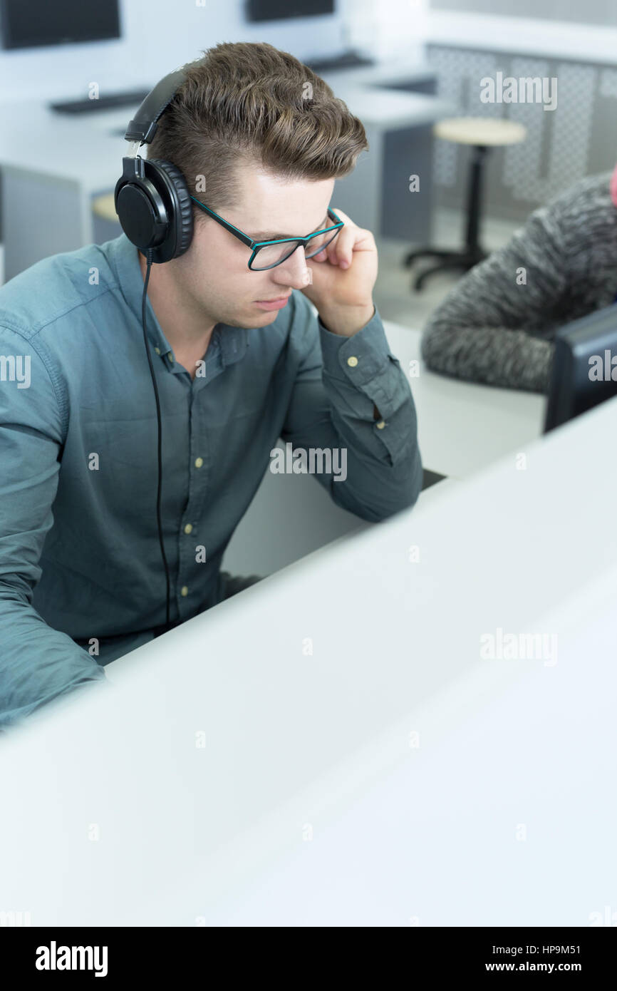 man working in the computer room at university Stock Photo - Alamy