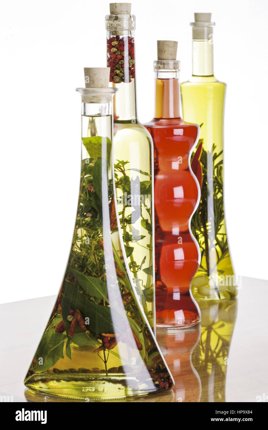 Essig und Oel in verschiedenen Glasflaschen Stock Photo