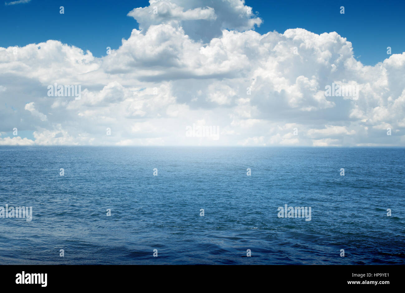 Blue ocean clouds in clear hi-res stock photography and images - Alamy
