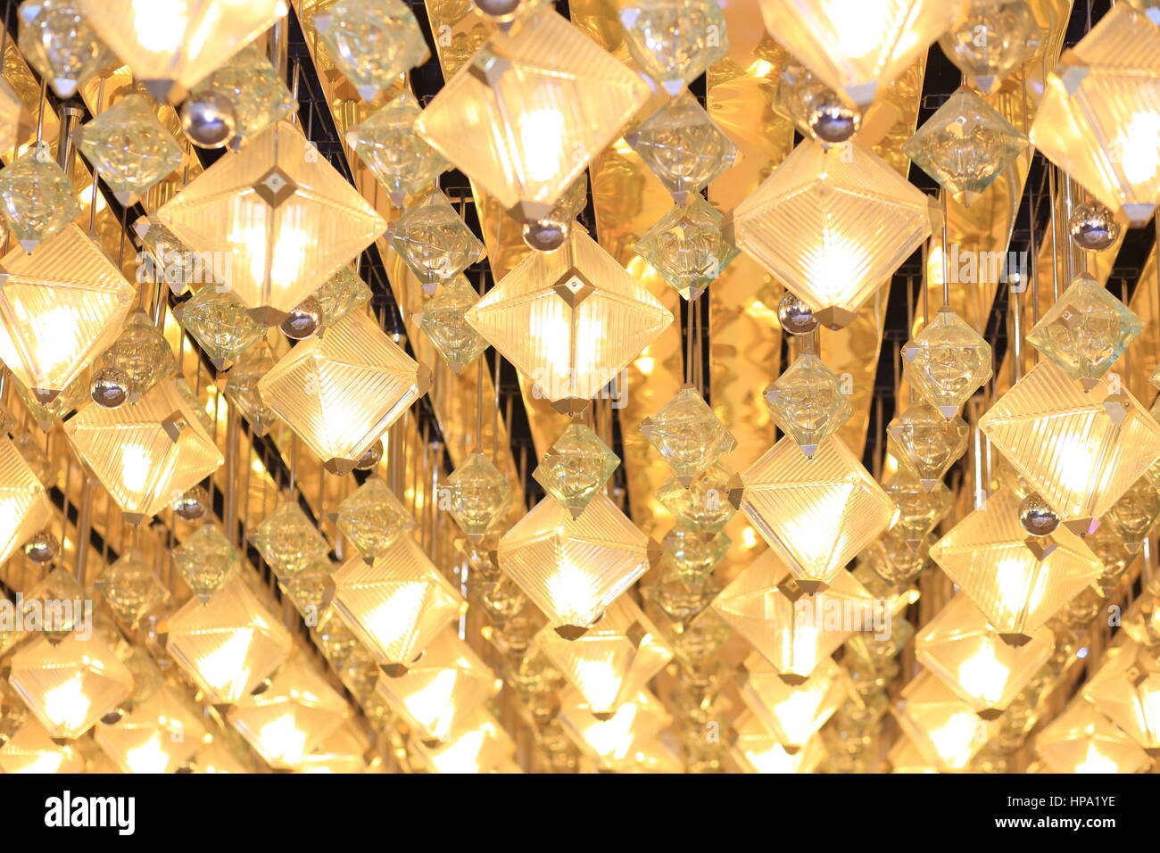 Shiny yellow  lanterns. Bright background with electric lights. Stock Photo
