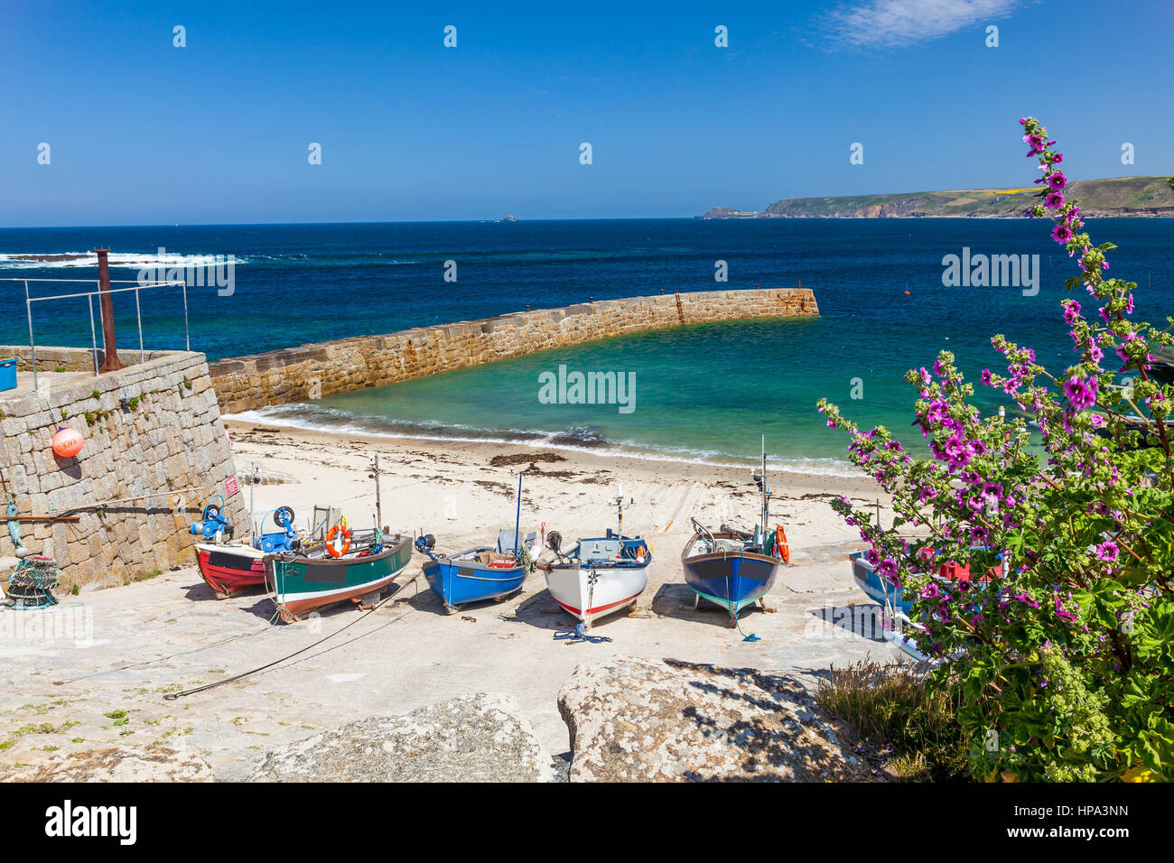 Small fishing boats in the harbour at Sennen Cove Cornwall England UK ...
