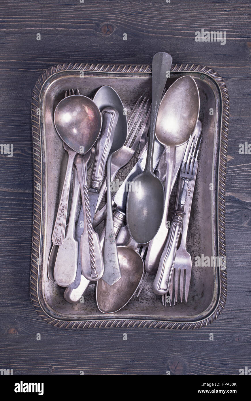 Vintage silverware in tray Stock Photo Alamy
