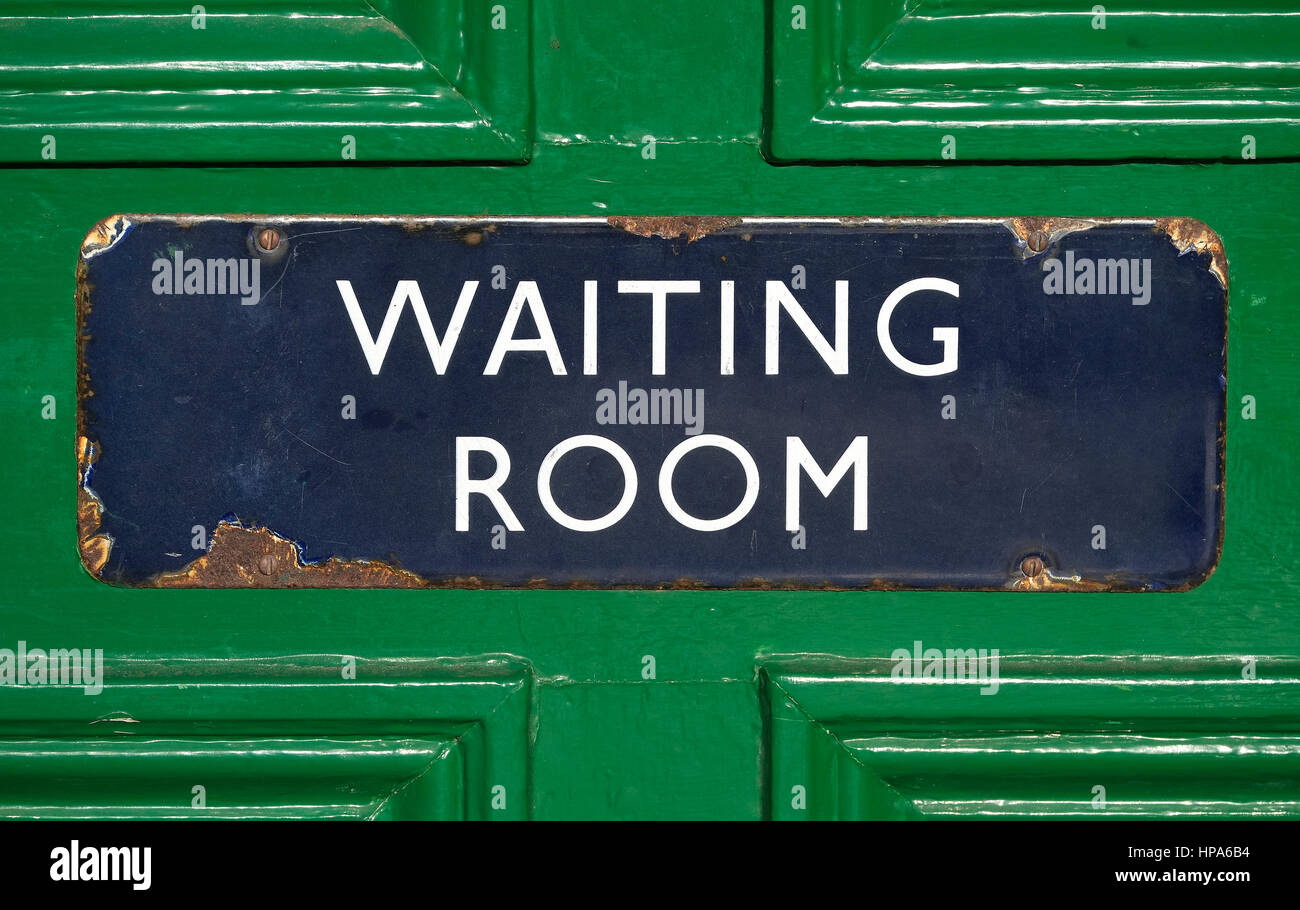 old metal waiting room sign Stock Photo
