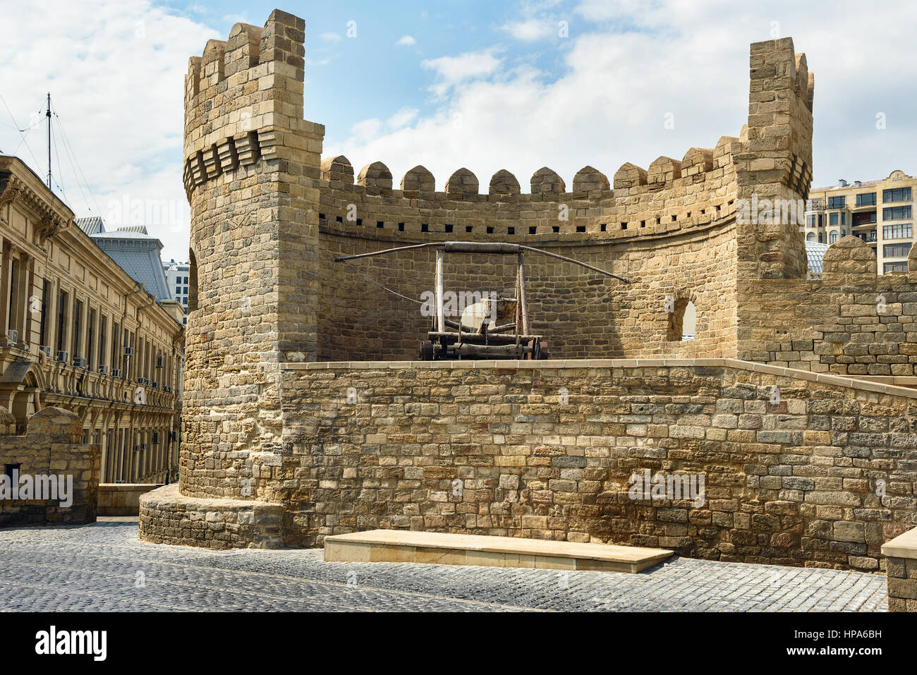 Baku, Azerbaijan - September 10, 2016: Ancient medieval catapult at tower of fortress in Old City, Icheri Shehe is the historical core of Baku. World  Stock Photo