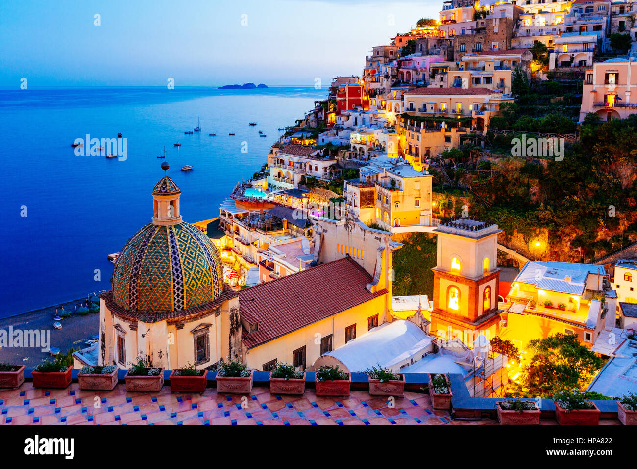Positano, Amalfi Coast, Campania, Sorrento, Italy. View of the town and the  seaside in a summer sunset Stock Photo - Alamy
