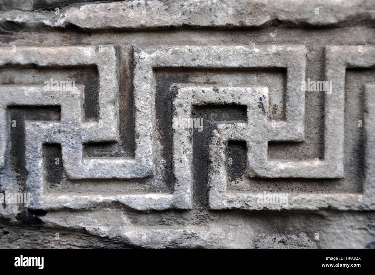 Ancient Roman architectural details. Carved stone Byzantine motif close-up Stock Photo