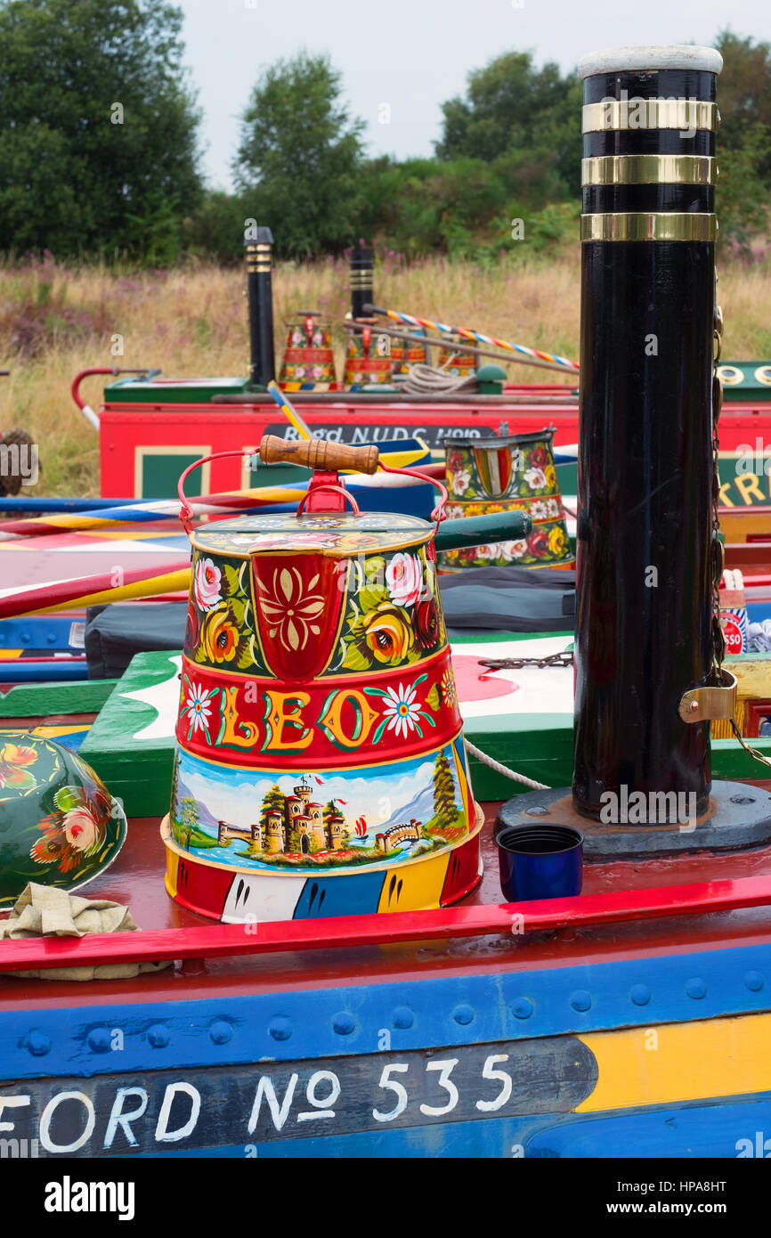 Decorated watering can on a narrowboat at the Inland Waterways Association Pelsall Canal Festival Wyrley and Essington Canal 2016 Stock Photo