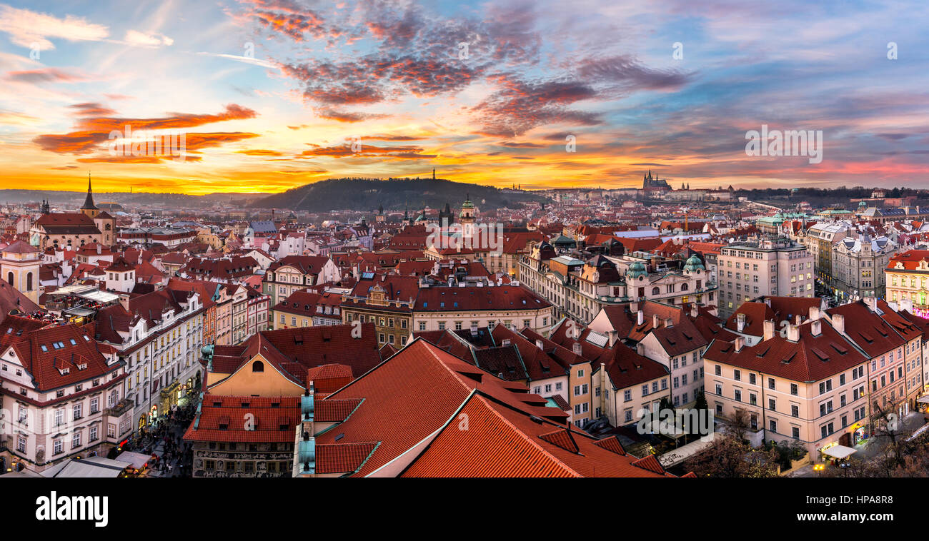 Most mystical and mysterious city in Europe. Prague through the eyes of birds at sunset with fantastic sky Stock Photo