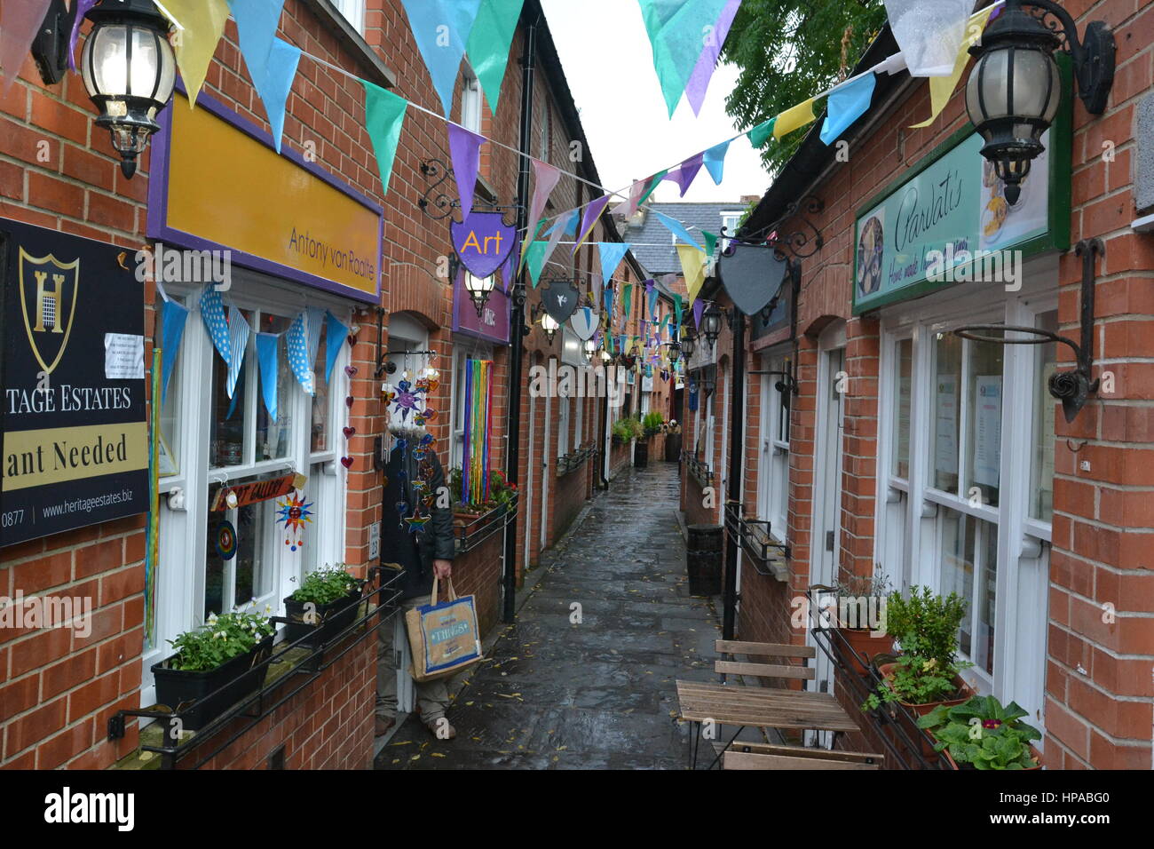Shops in The Gauntlet, St John's Square, Glastonbury, Somerset Stock