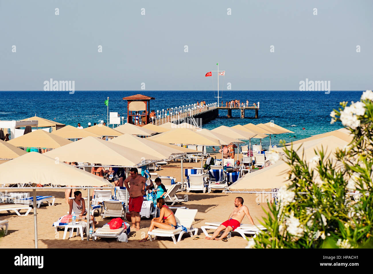 People Enjoying Summer Holiday At Beach Stock Photo