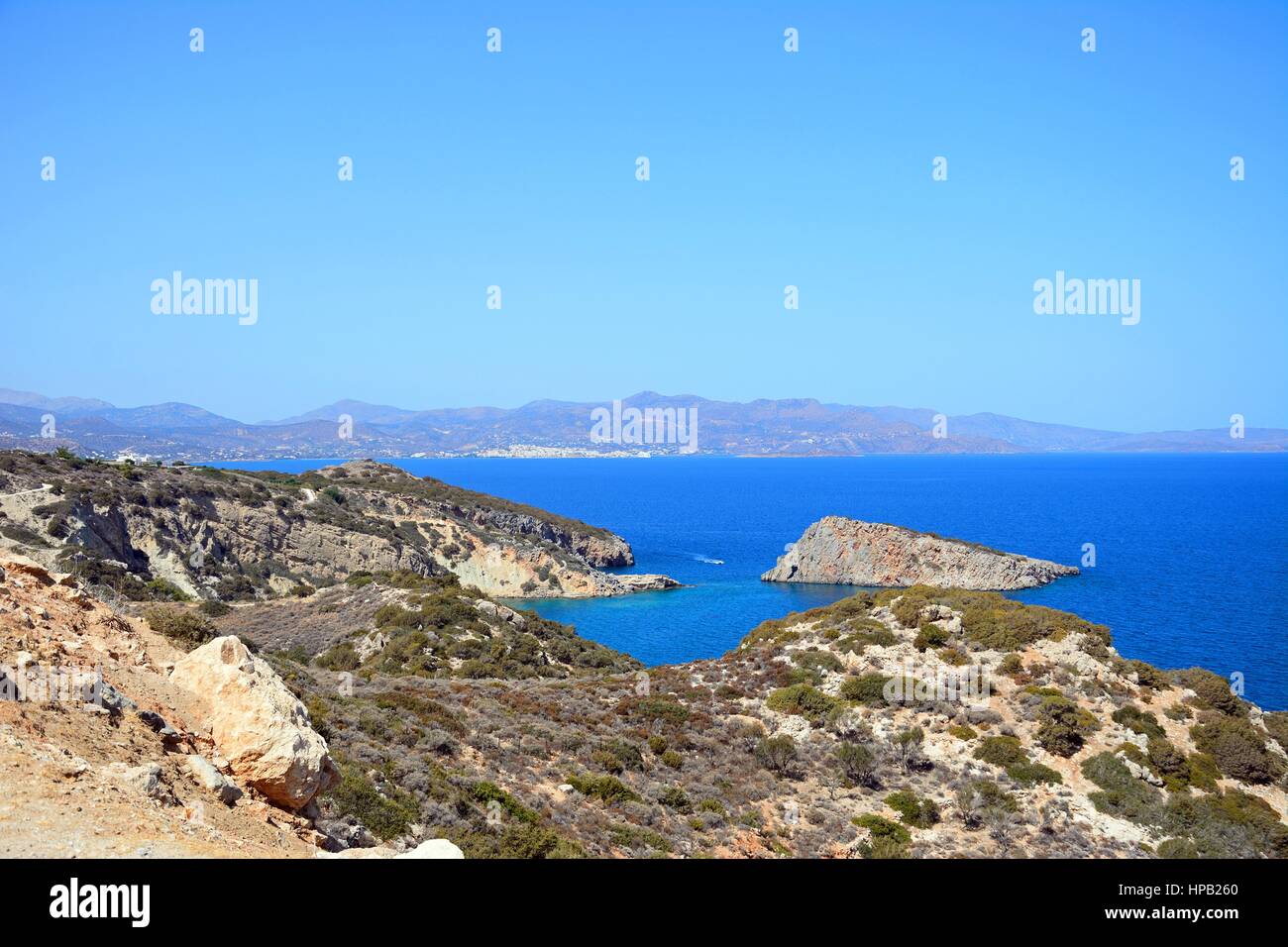 Elevated view of the beach and rugged coastline near Ammoudara, Crete, Greece, Europe. Stock Photo