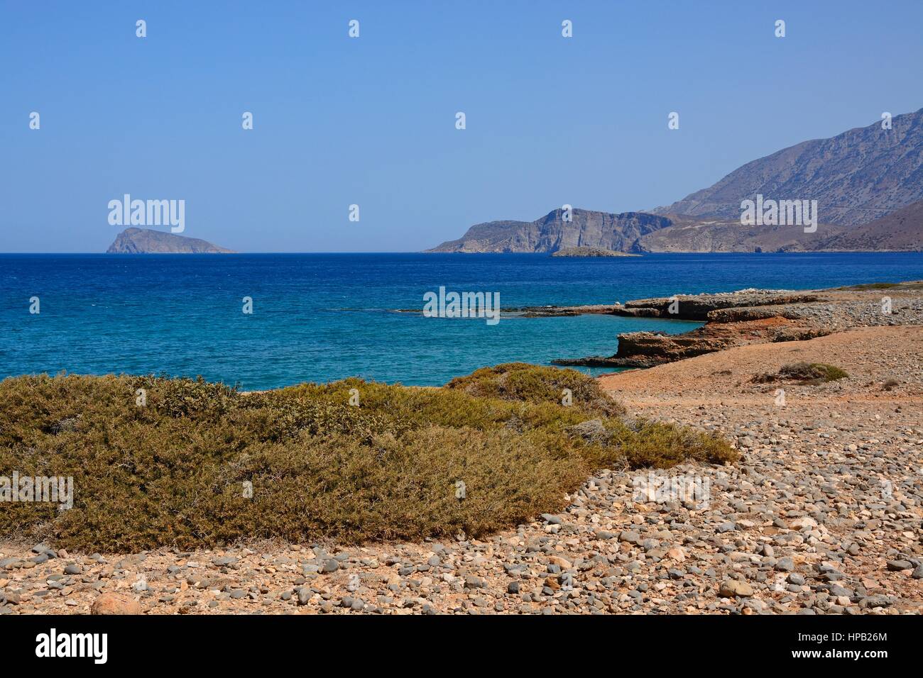 View of the sea and rugged coastline near Ammoudara, Crete, Greece, Europe. Stock Photo