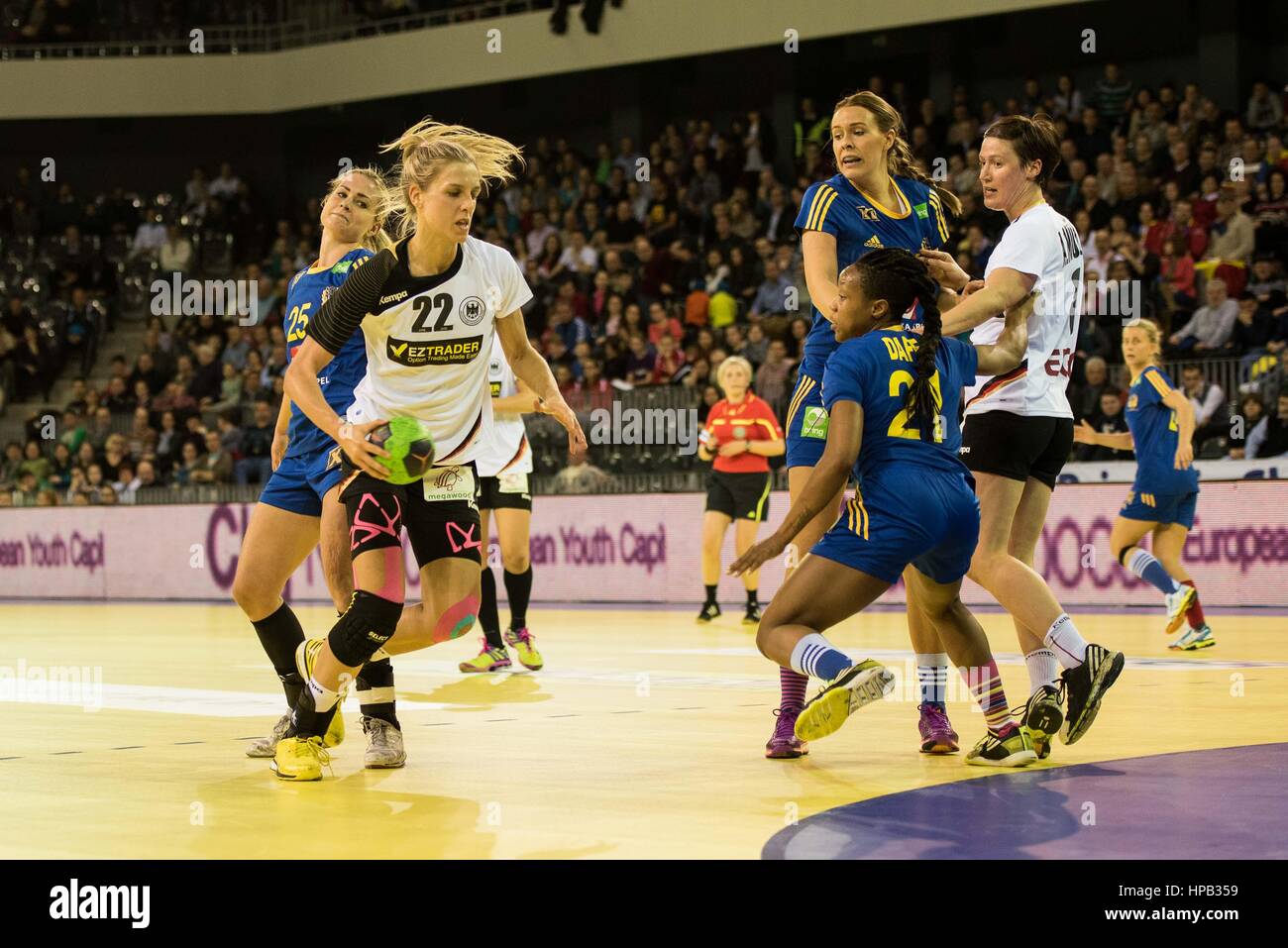 March 20, 2015: Susan Muller #22 of Germany National Team  and Dafe Edijana #21 of Sweden National Team  in action during the women's Carpathian Trophy handball tournament match between Sweden and Germany at "Polyvalent Hall" Cluj Napoca, Romania ROU.   Photo: Cronos/Catalin Soare Stock Photo