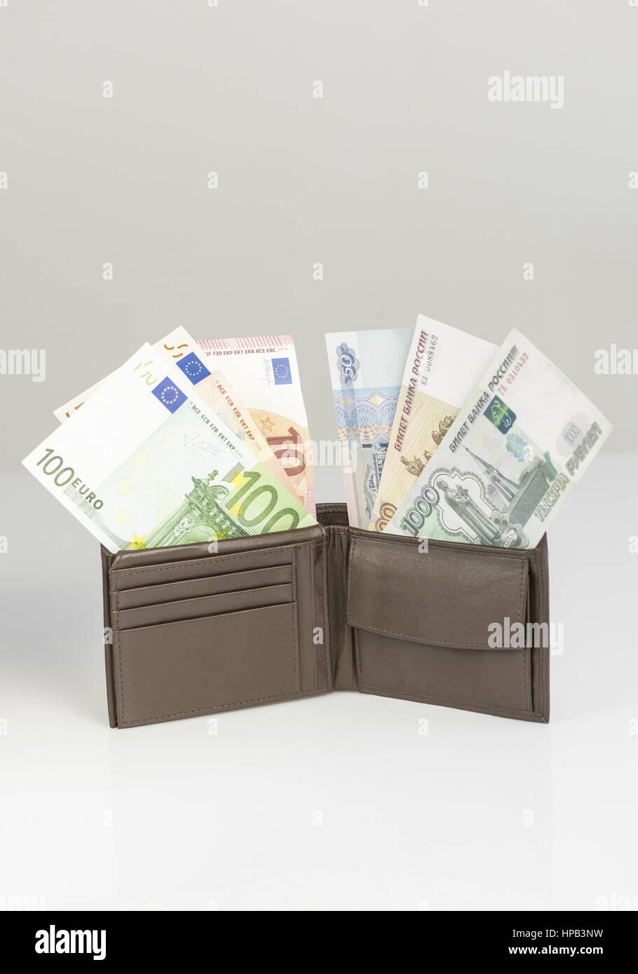 Geldboerse mit Geldscheinen, Euro, Rubel Stock Photo
