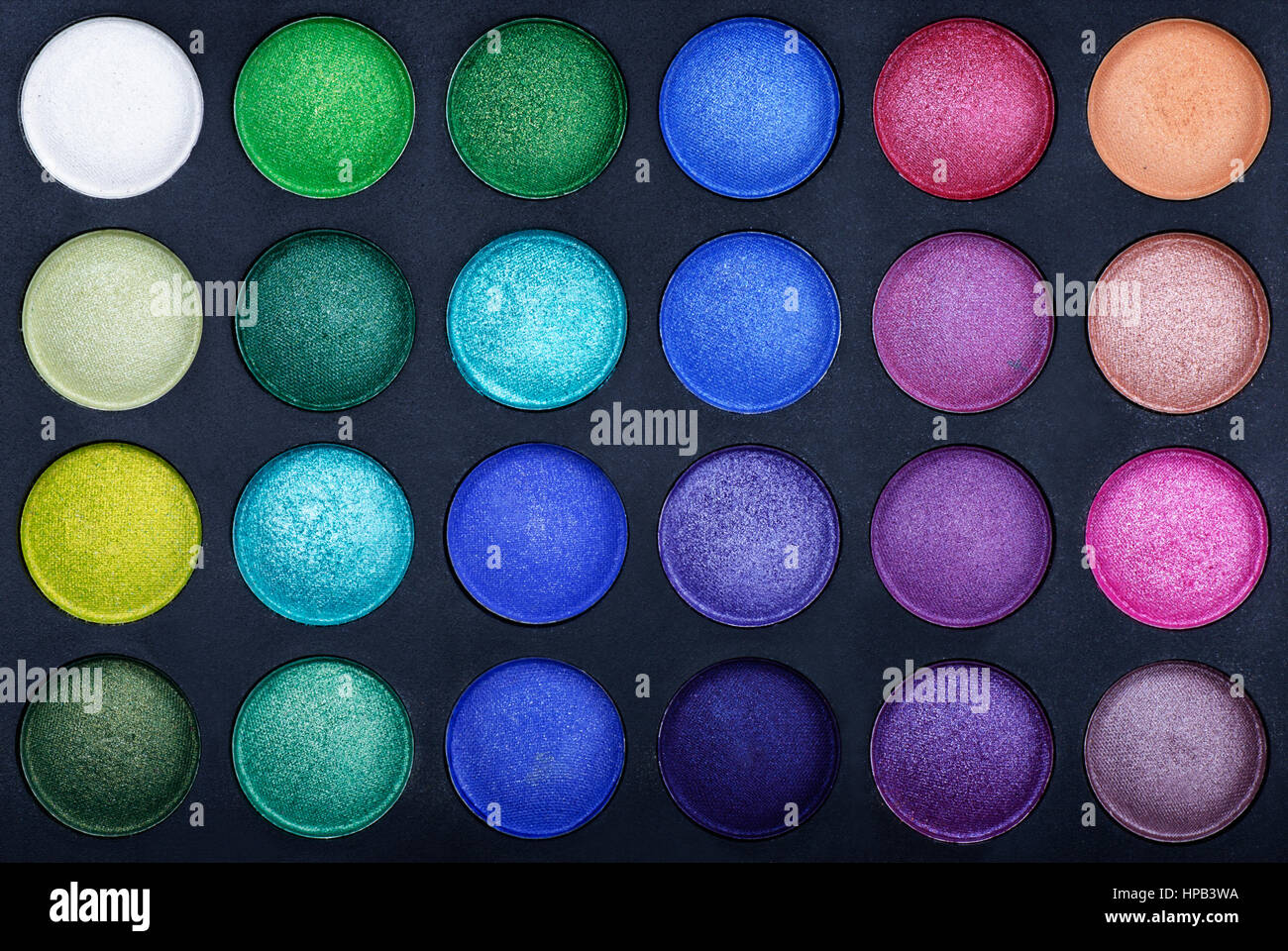 Make-up colorful eyeshadow palettes as background Stock Photo