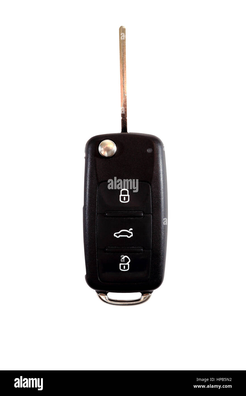 Black ignition key closeup. Black car key over white background Stock