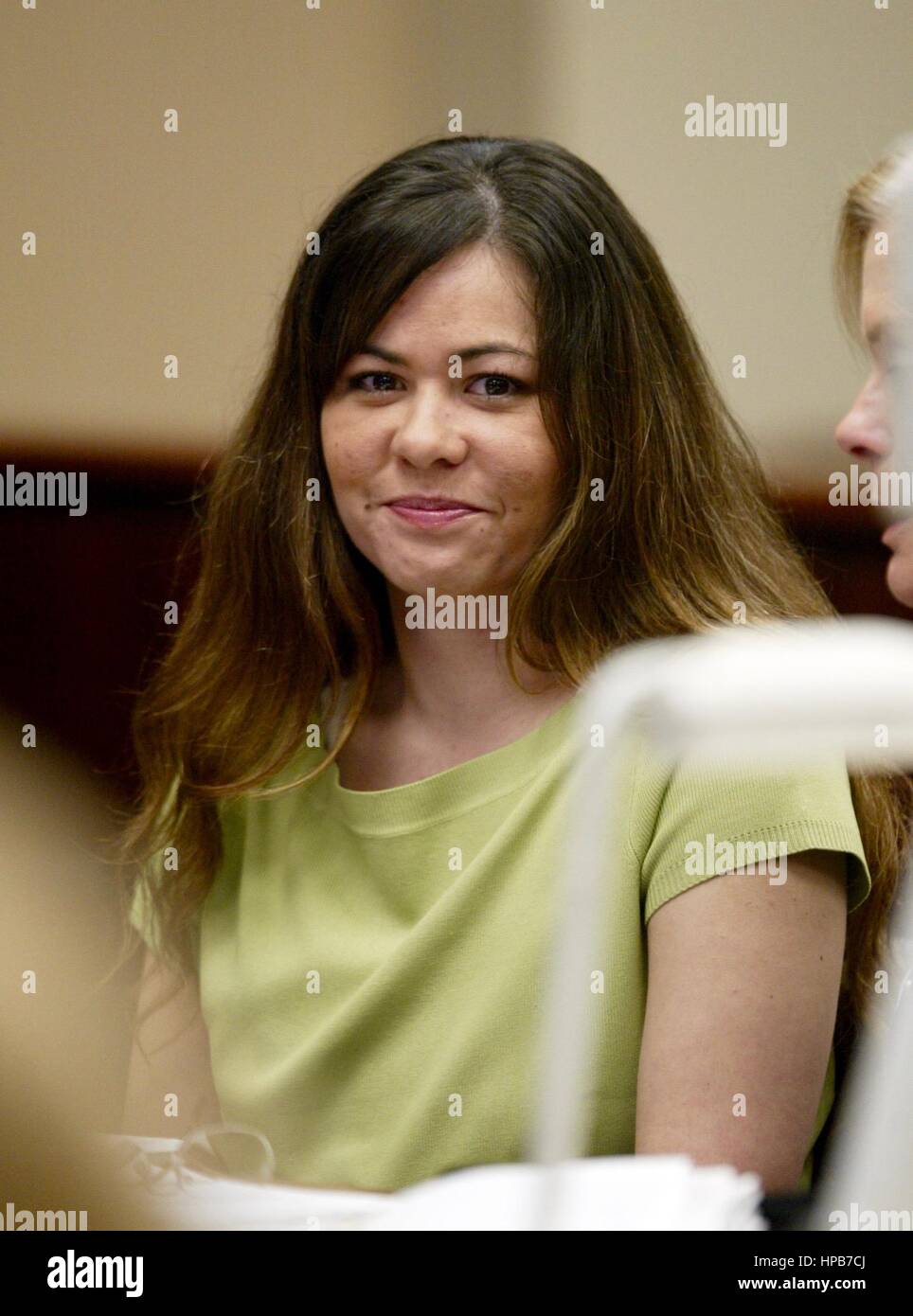 Angela Parks smiles at a preliminary hearing at the Riverside