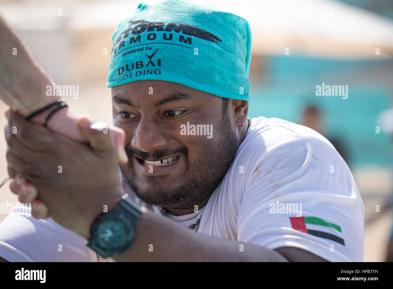 Dubai, UAE - Feb 10th, 2017: Participating in the SandstormDXB race: an off-track obstacle running competition. Stock Photo