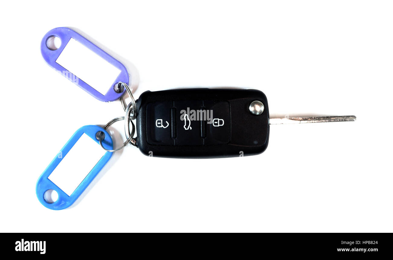 Close up car ignition key isolated on white background. Black car key