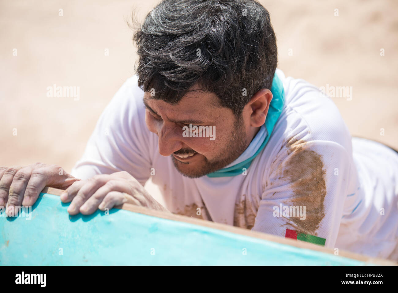 Dubai, UAE - Feb 10th, 2017: Participating in the SandstormDXB race: an off-track obstacle running competition. Stock Photo