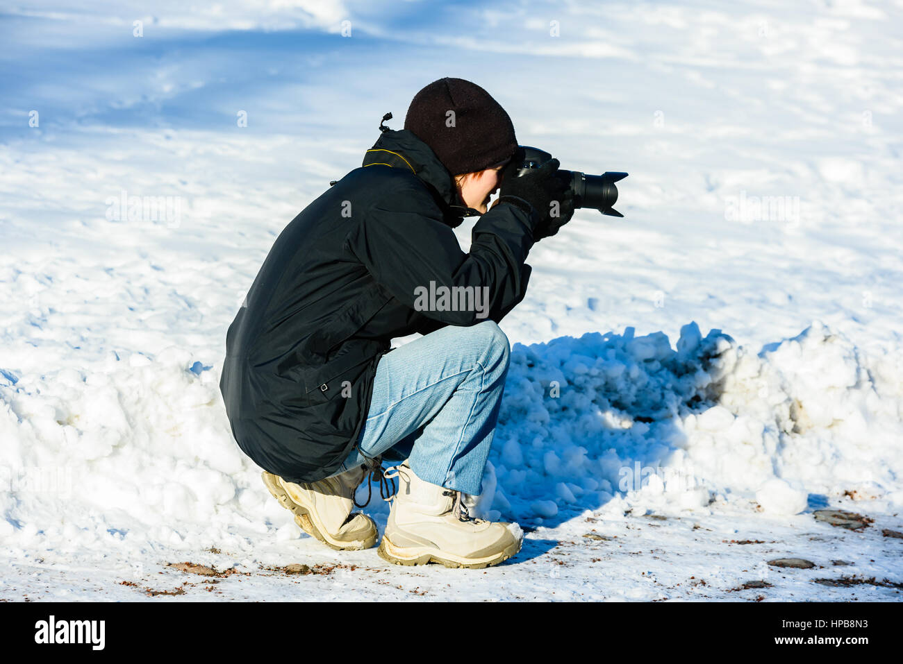 Photographer Kneeling High Resolution Stock Photography and Images - Alamy