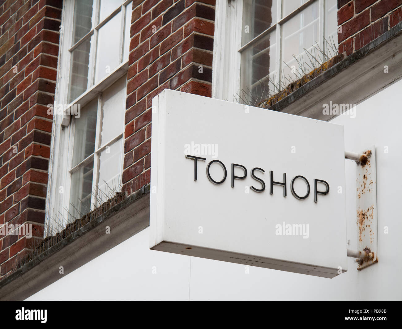 Topshop and Topman ladies and gentlemen high street fashion store, sign over store entrance Stock Photo