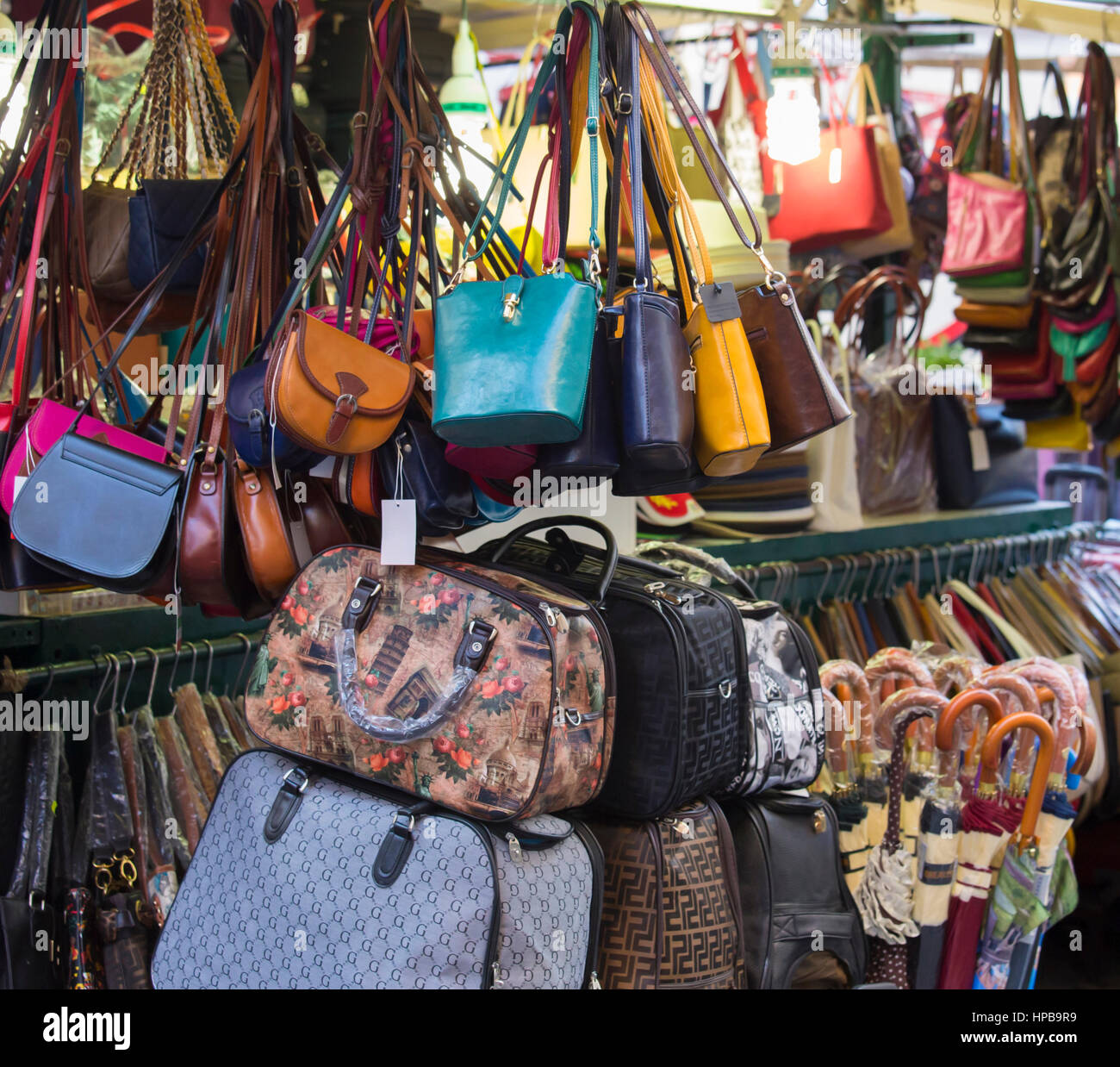Pile of used worn secondhand bags handbags for sale Stock Photo - Alamy