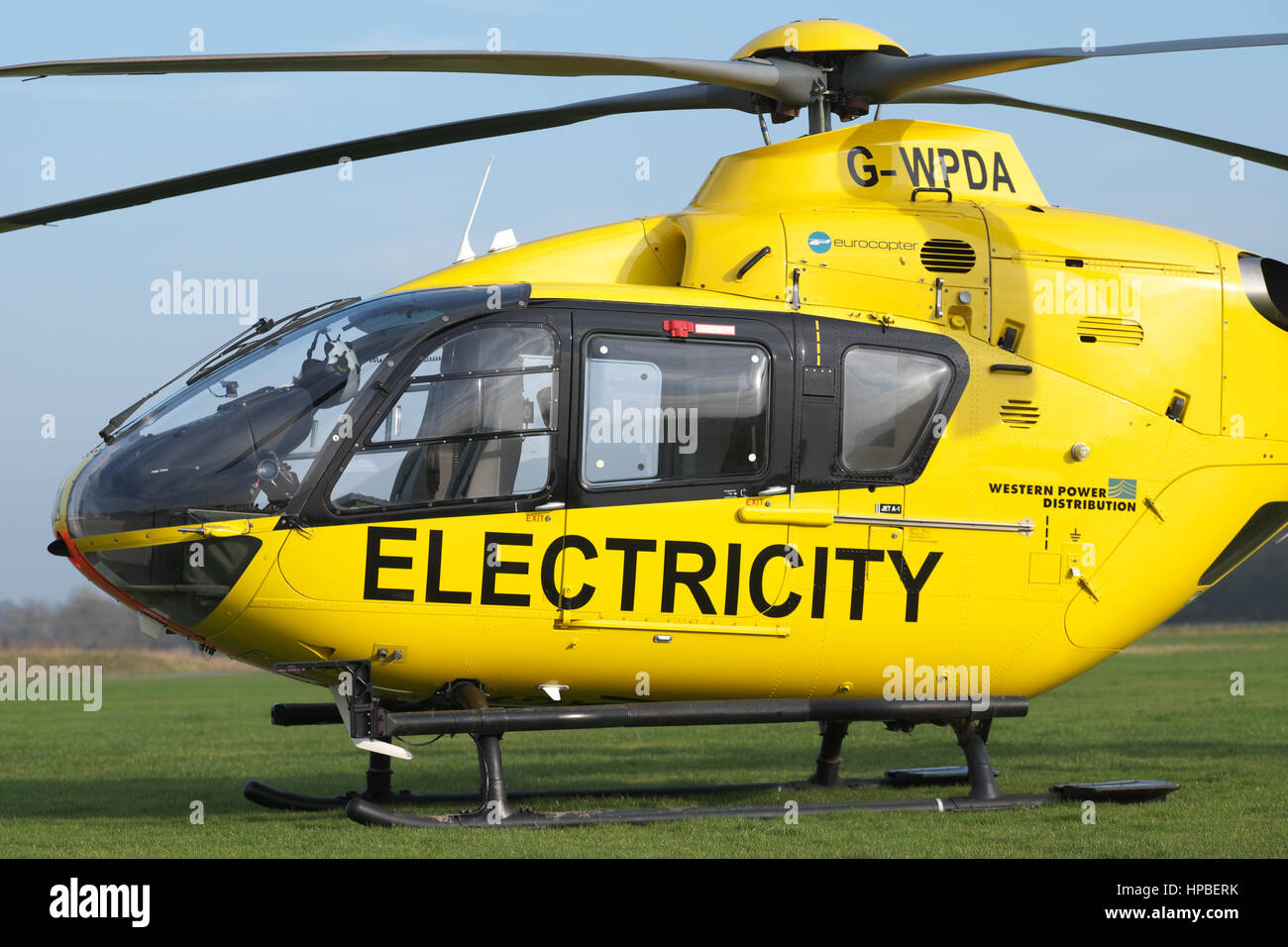 Eurocopter EC 135 helicopter used for electricity power supply checking by Western Power Distribution WPD in UK Stock Photo