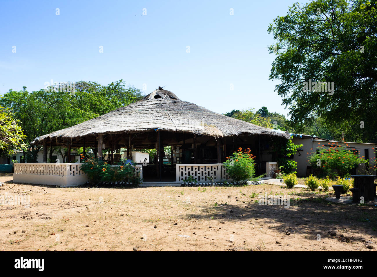 African roundhouse shelter at Tendaba Camp on the River Gambia Stock Photo