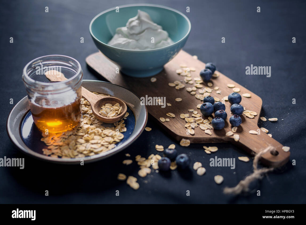 Greek yogurt with bueberries, oats and honey Stock Photo Alamy