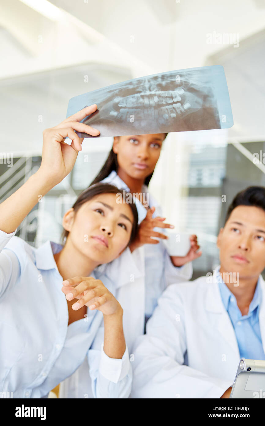 Team of radiologist doctors analyzing x-ray image for diagnostic Stock ...