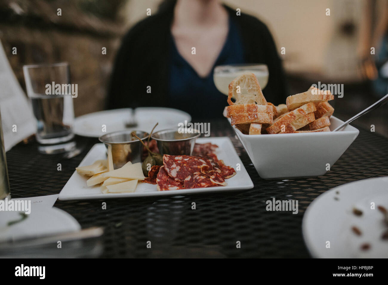 Meat and cheese charcuterie plate with parmesan, salami, and goat Stock
