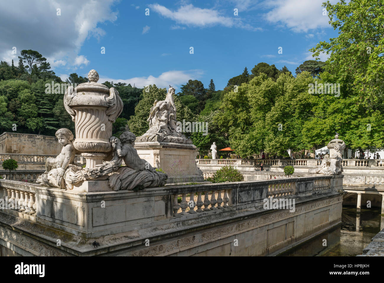 Le Nymphée with sculpture group at the park Les Jardin de la Fontaine in Nimes, France Stock Photo