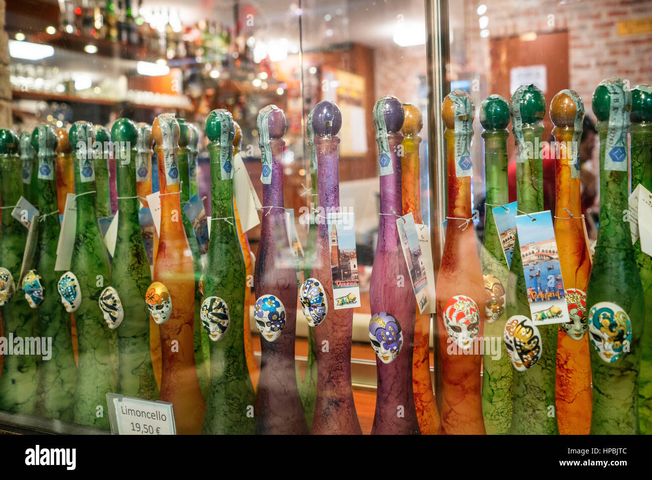 Raw of Limoncello liqueur bottles, Venice, Italy Stock Photo