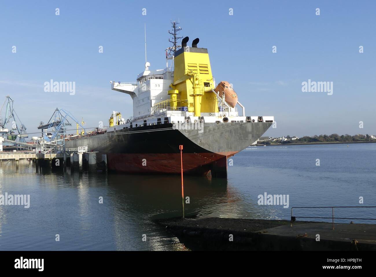 Products Tanker  in operations at the Oil Terminal of Lorient, Brittany France. Stock Photo