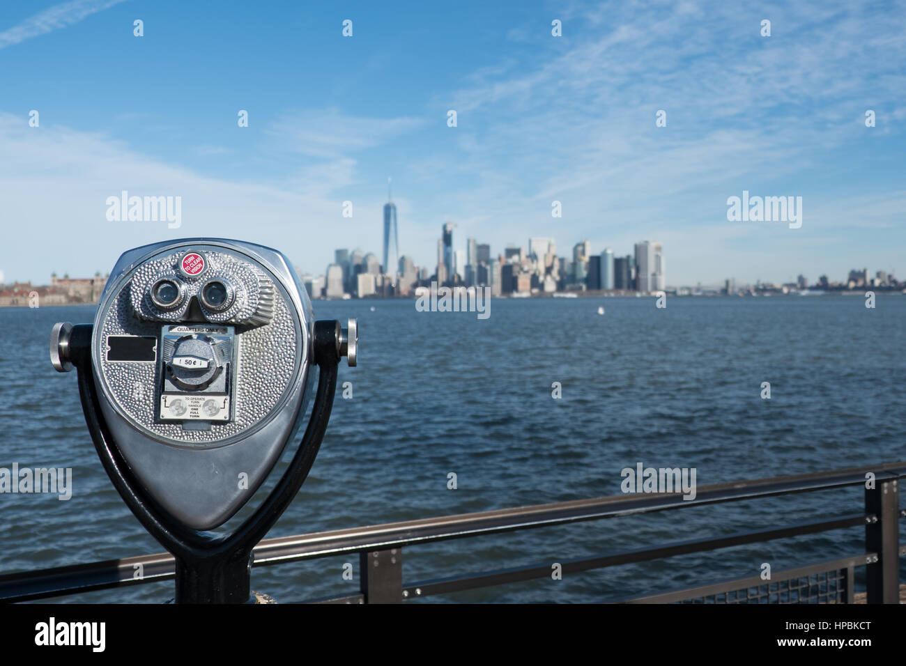 Tower viewer telescope looking at lower Manhattan skyline from Liberty