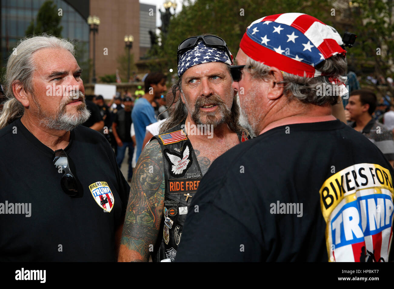 Members of the group Bikers for Trump talk during a heated protest outside of the Republican National Convention on July 21, 2016. Cleveland, Ohio, Un Stock Photo