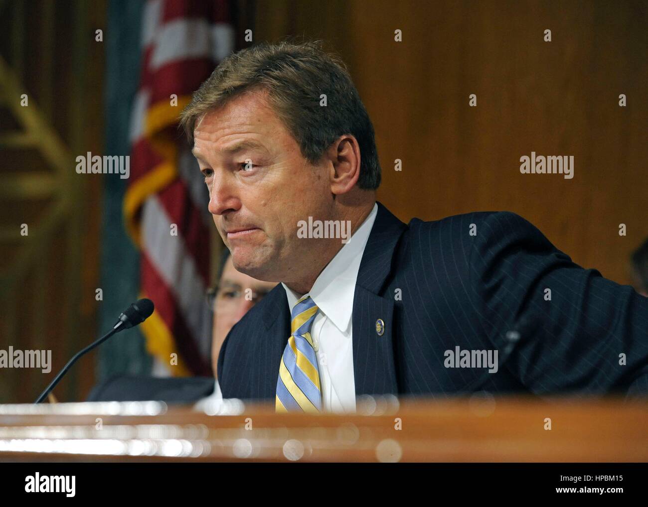 U.S. Senator Dean Heller, of Nevada asks a question of Dr. David Shulkin during confirmation hearings in the Senate Veterans Affairs Committee February 1, 2017 in Washington, DC. Shulkin was confirmed as the new head of the Veterans Affairs administration by a unanimous vote. Stock Photo