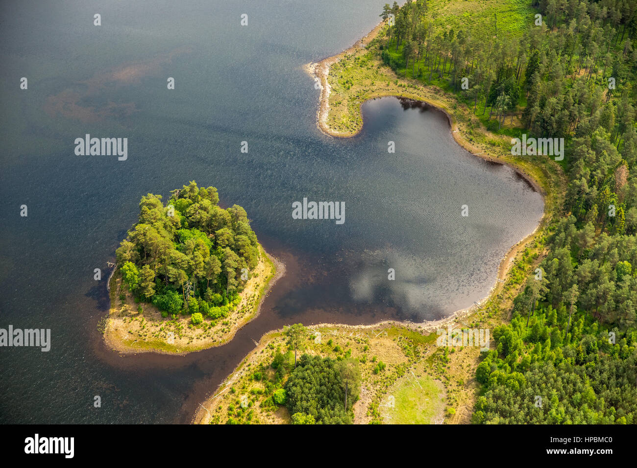 Lake landscape, Pomerania, reflection in water, wooded island, Leśnice, Baltic coast, pomorskie, Poland Stock Photo
