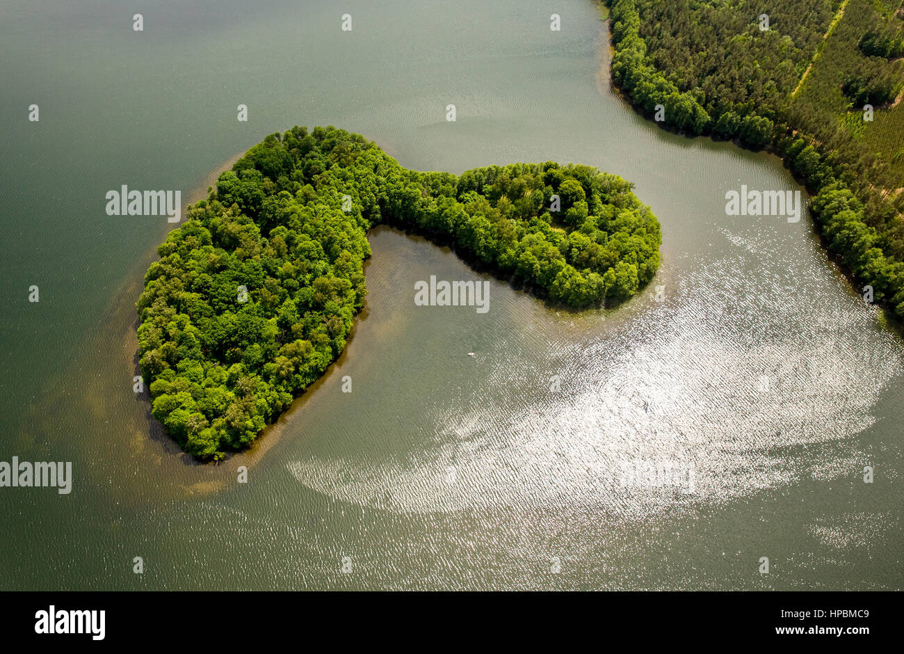 Lake landscape, Pomerania, reflection in water, wooded island, Leśnice, Baltic coast, pomorskie, Poland Stock Photo
