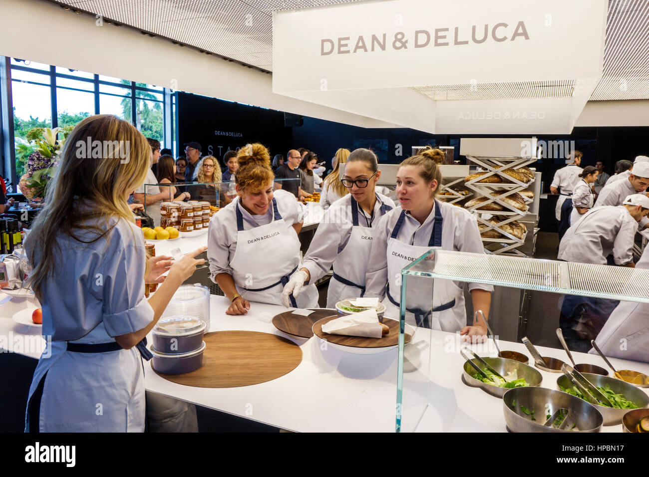 Miami Beach Florida,Convention Center,Art Basel Week,art fair,Design Miami,Dean & Deluca,gourmet deli,food,ole scheeren,display sale Hispanic woman fe Stock Photo