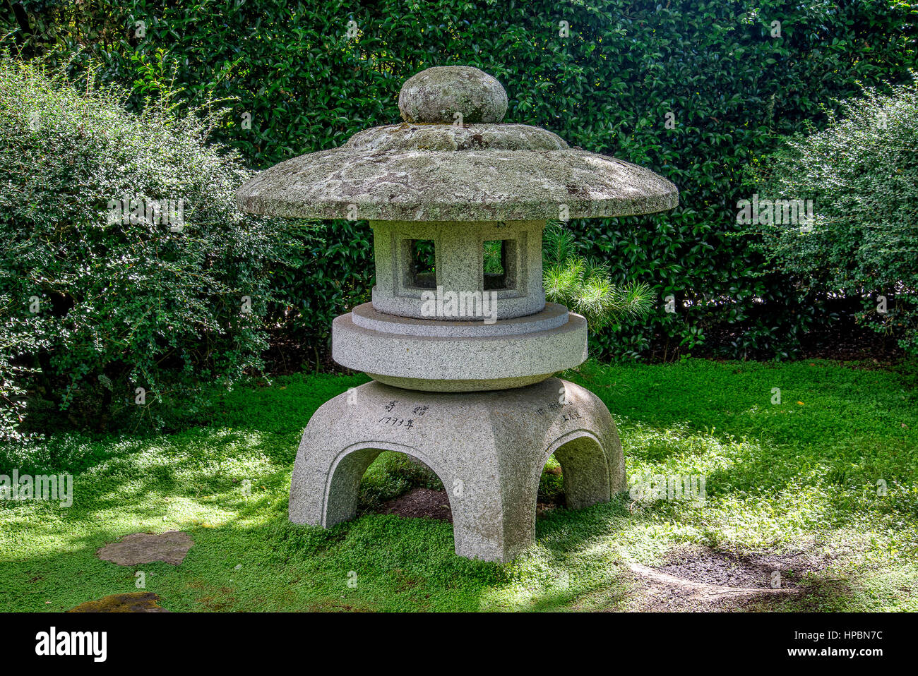 Scenic stone made arbour in Japanese Garden, Hamilton Botanical Gardens, New Zealand, North Island Stock Photo