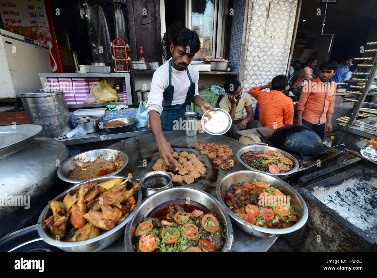 Preparing the famous minced kebabs in Tunday Kababi in Lucknow. Stock Photo