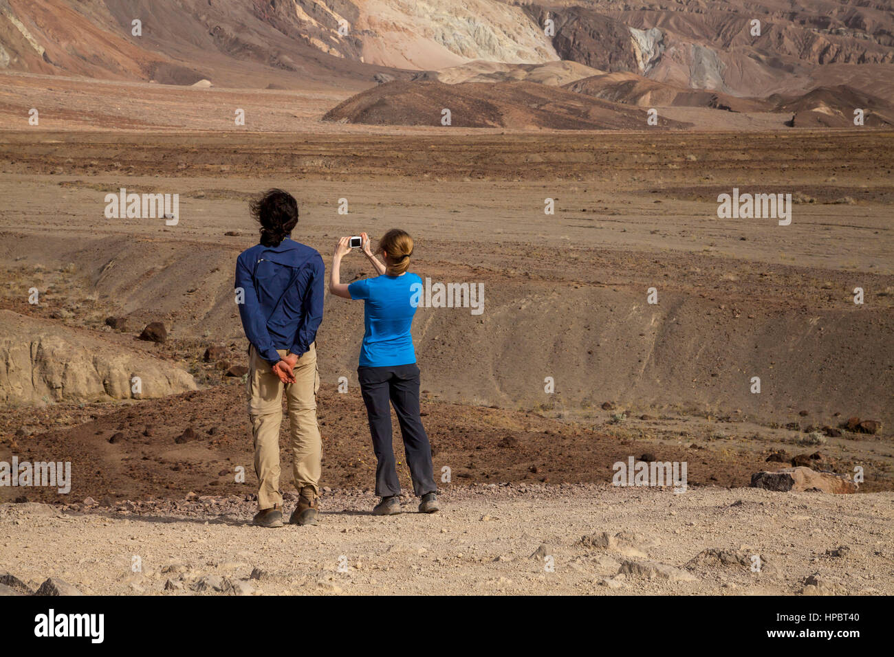 Couple taking photos in Death Valley, California, USA Stock Photo