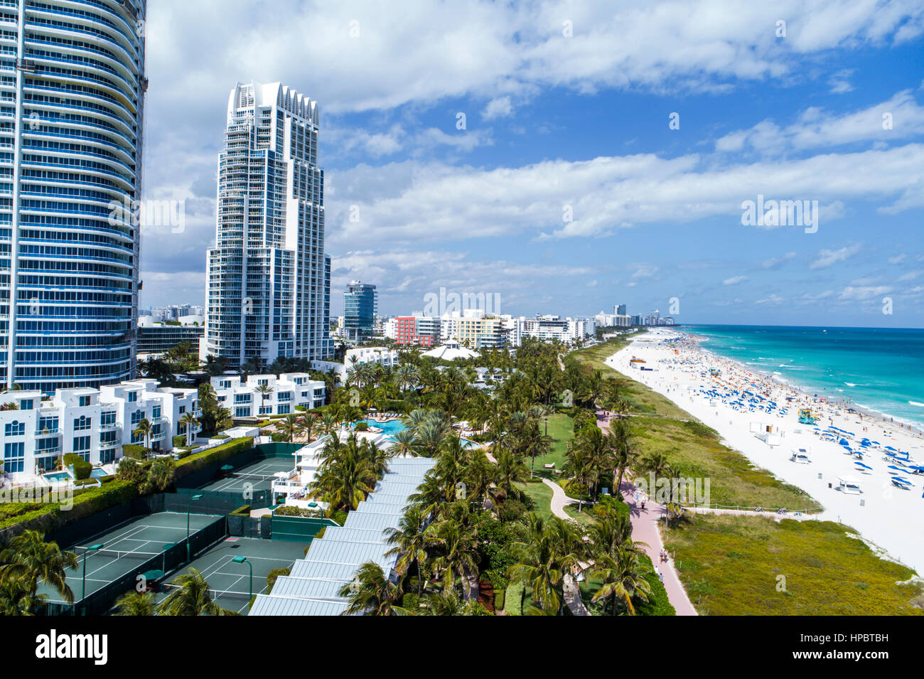 Florida South,Miami Beach,Atlantic Ocean water,shore,shoreline,water,Continuum,high rise residential building,aerial overhead from above view,visitors Stock Photo
