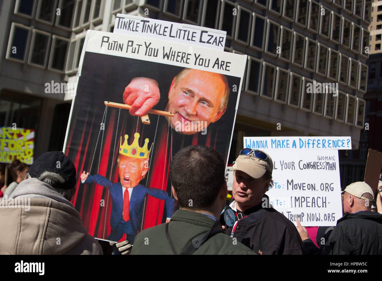 Philadelphia, USA. 20th February, 2016. Protestors gather at Thomas Paine Plaza across from Philadelphia CIty Hall, Monday, February 20, 2017. Part of a nationwide 'Not My President' mobilization coinciding with the national holiday celebrating George Washington's birthday, they voiced concerns about President Donald Trump's executive actions on immigration, the environment and other issues. Credit: Michael Candelori/Alamy Live News Stock Photo