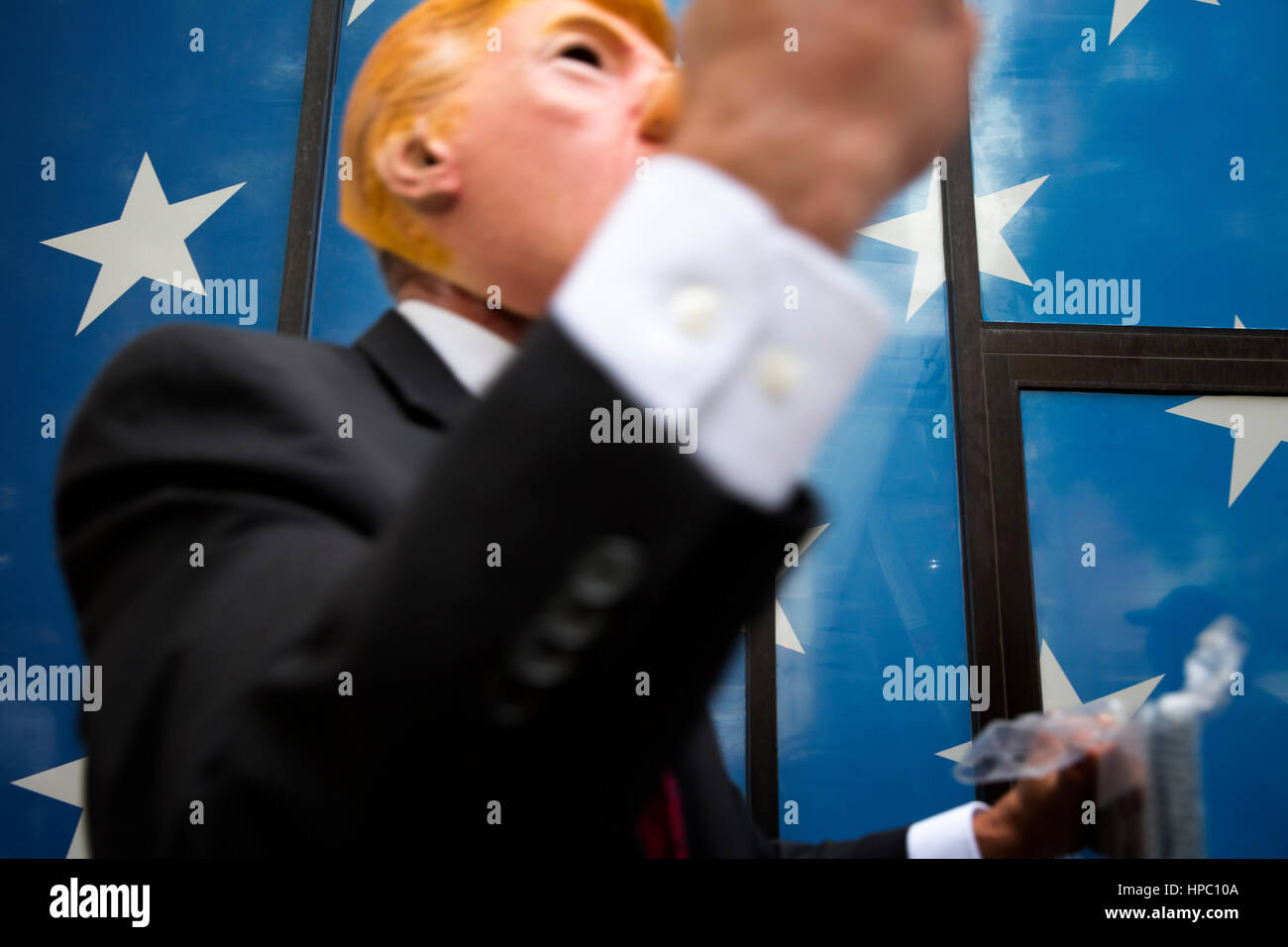A man wearing a Donald Trump mask walks outside the Republican National Convention on July 17, 2016. Cleveland, Ohio, United States. Stock Photo