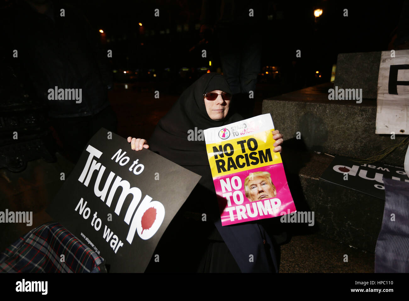 Manchester, UK. 20th Feb, 2017. Mariam Khan holding placards which read 'No to Trump' and 'No to racism', Albert Square, Manchester, 20th February, 2017 Credit: Barbara Cook/Alamy Live News Stock Photo