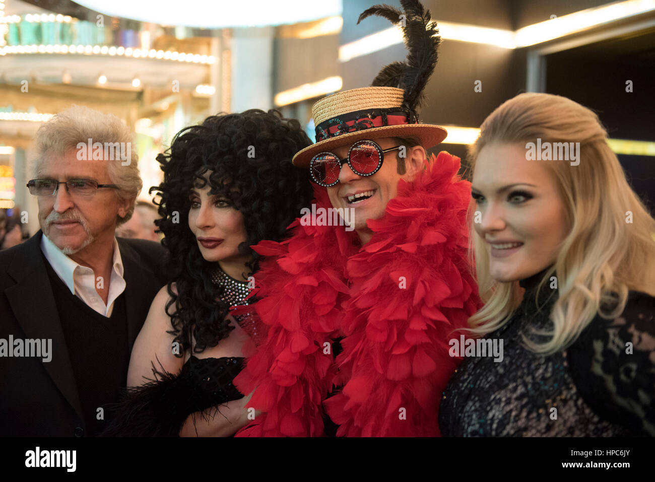 Las Vegas, USA. 20th Feb, 2017. Cher impersonator Heidi Thompson, second from left, Elton John impersonator Gene Sironen, third from left, and an Adele impersonator, right, pose on the red carpet prior to The Reel Awards at the Golden Nugget Hotel & Casino in Las Vegas, Nev., on February 20, 2017. The awards show is meant to be a humorous tribute to the Academy Awards. (Photo by Jason Ogulnik) Credit: Jason Ogulnik/Alamy Live News Stock Photo